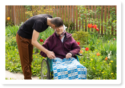 Compassionate caregiver assisting senior patient in Hialeah